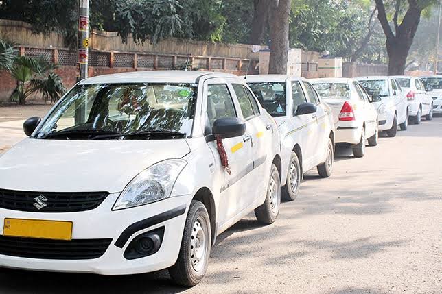 Taxi driver ready for passenger pickup